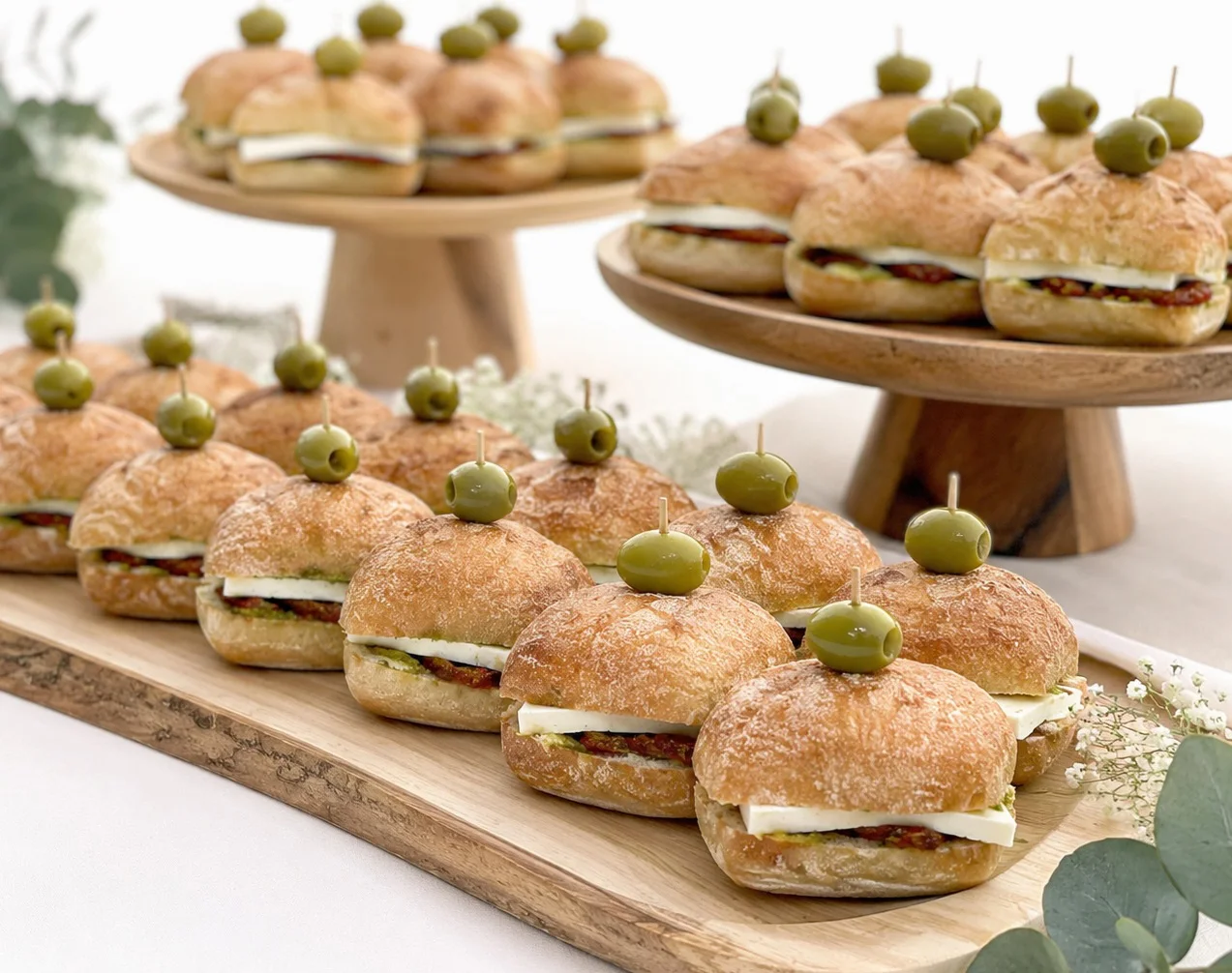 A La Cart sandwiches arranged on wooden risers